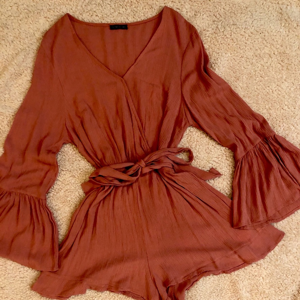 The cutest bell long sleeve romper
